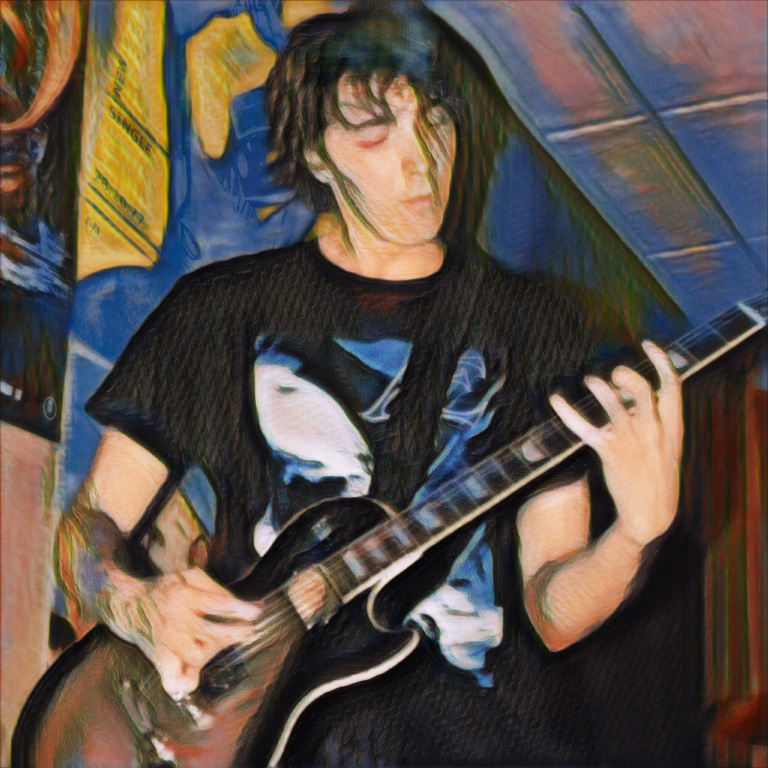 Nate guitarist rocks his instrument